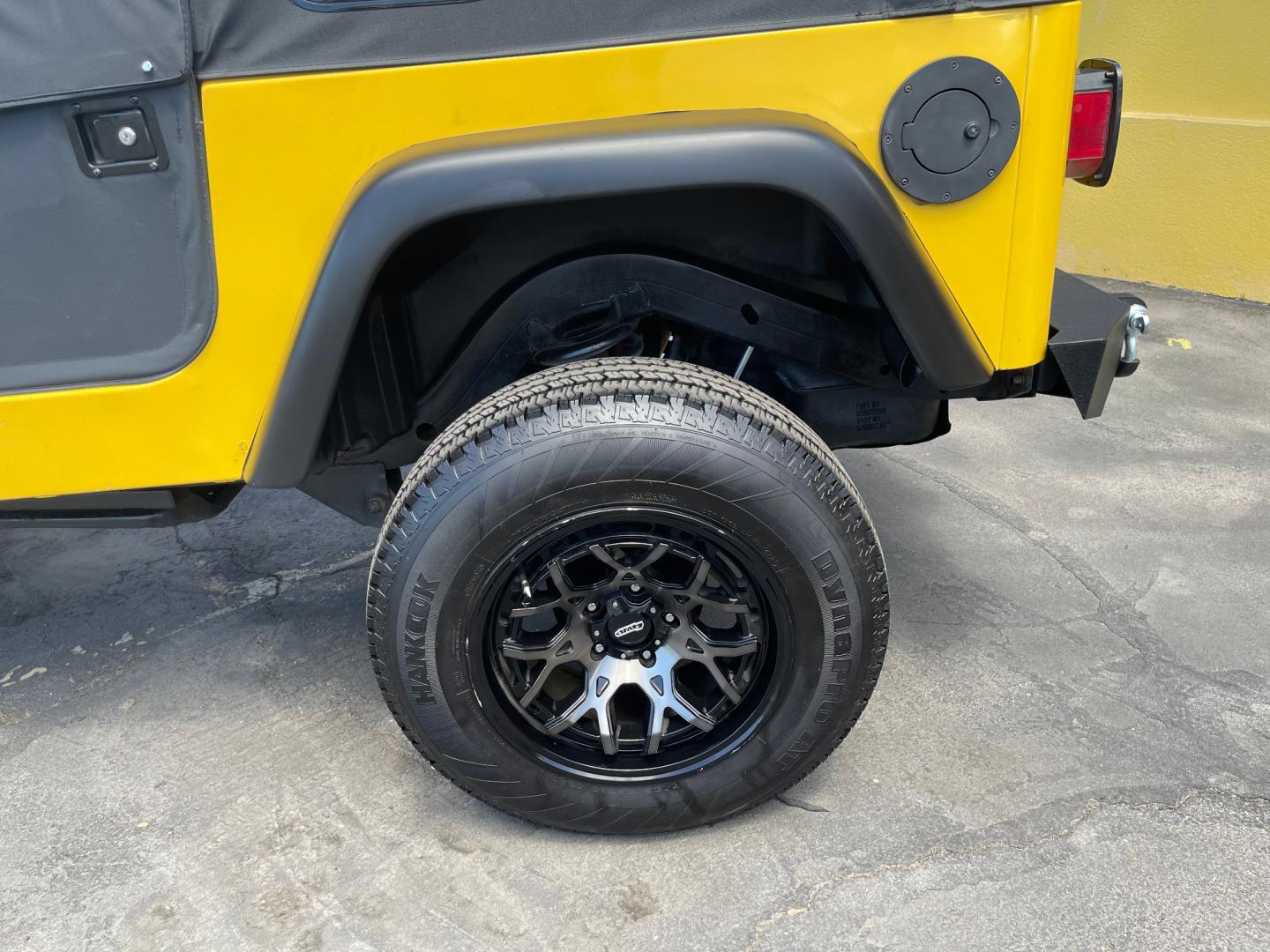 2000 Solar Yellow /Black Jeep Wrangler SE (1J4FA29P9YP) with an 2.5L 4 Cyl. engine, Manual transmission, located at 801 South State Street, Salt Lake City, UT, 84111, (801) 328-0098, 40.751953, -111.888206 - Wow extremely rare to find extra clean Jeep in immaculate condition 4x4! Low miles only 98,248 miles! Interior and exterior are both in excellent shape for the year. This is a clean title no reported accidents on the CarFax history report. It has passed emissions already and is ready to go. Featur - Photo#31